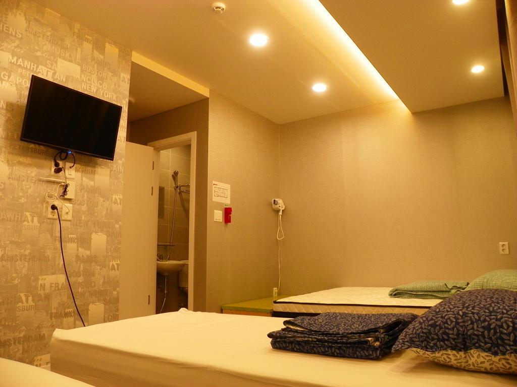 Feliz Casa Hotel Seul Quarto foto